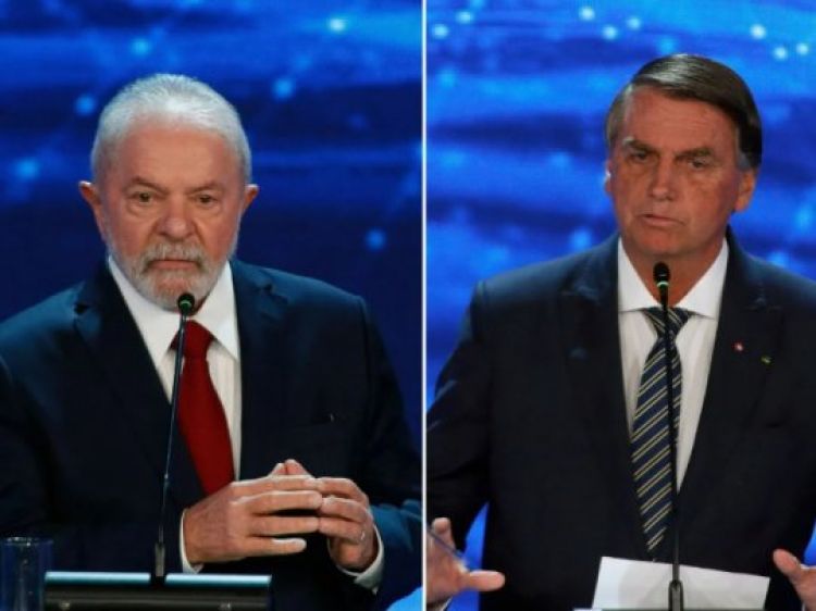 Ipec: Lula lidera com 51% dos votos válidos e Bolsonaro tem 37% (Foto:  Miguel Schincariol/AFP)